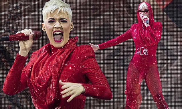 Katy Perry showcases her toned physique in glittering space age leotard in London Katy Perry showcases her toned physique in glittering space age leotard in London