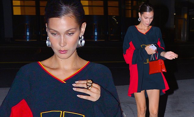 Bella Hadid shows off her legs in a tiny black and red shirt dress as she steps out in New York Bella Hadid shows off her legs in a tiny black and red shirt dress as she steps out in New York