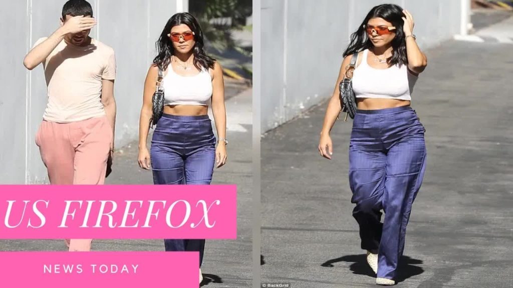 Kourtney Kardashian shows off her sculpted midriff in blue and white after cheering on LA Dodgers Kourtney Kardashian shows off her sculpted midriff in blue and white after cheering on LA Dodgers