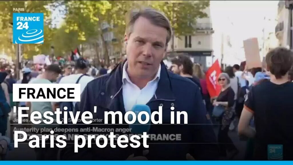 ‘Rather festive’ mood in central Paris as thousands protest budget cuts ‘Rather festive’ mood in central Paris as thousands protest budget cuts